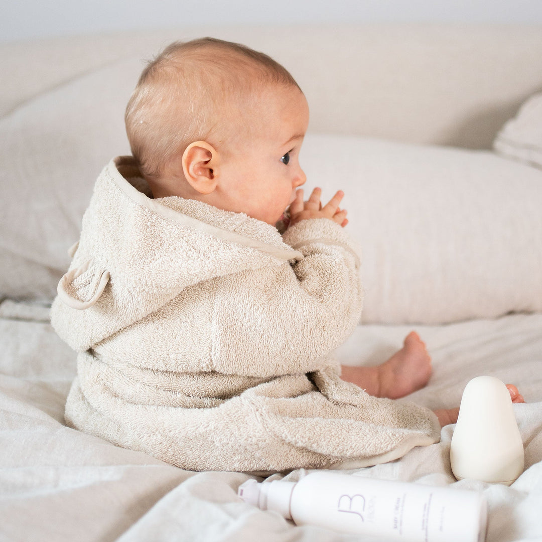 Choosing the Best Baby Bathrobe: Organic Cotton vs Polyester Explained