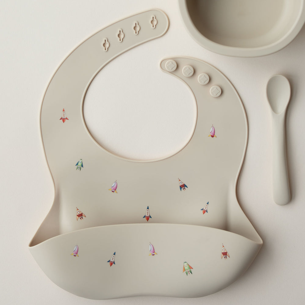 JBØRN Silicone Baby Feeding Bib Rockets Vanilla - Personalisable Baby Products Sold and Personalised by JustBørn